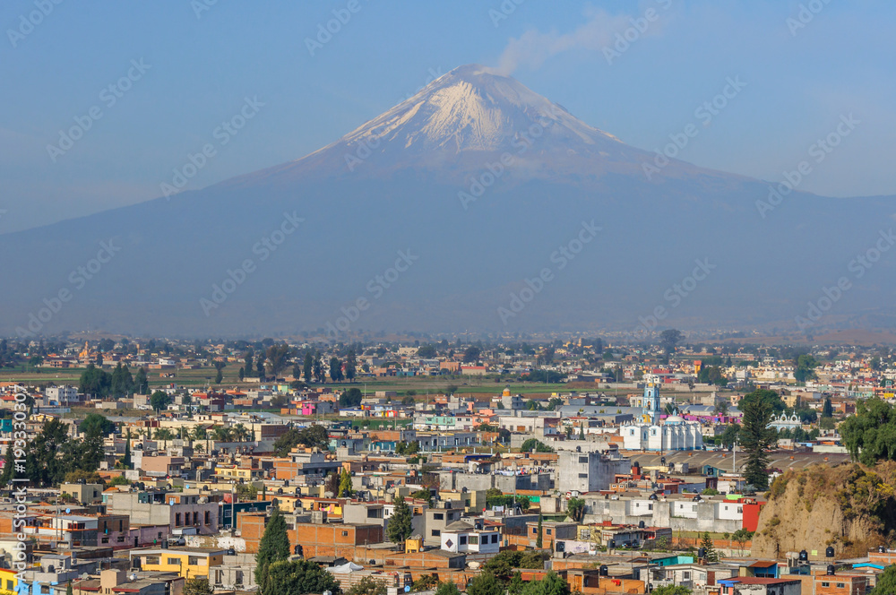 San Pedro Cholula and Popocatepetl volcano seen from Shrine of Our Lady of Remedies, Mexico