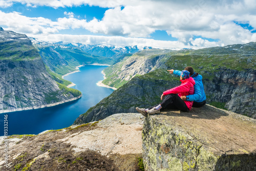 Couple posing on Trolltunga Norway photo
