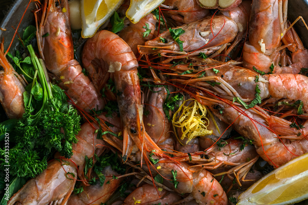 Many shrimps in a paella pan, cooking background