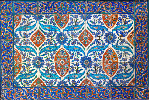 Ottoman era style glazed ceramic tiles from Iznik (Turkey) decorated with floral ornamentations photo