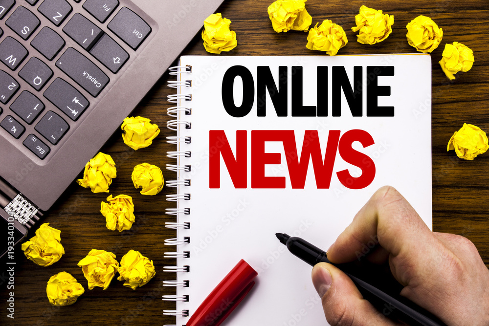Conceptual Hand Writing Text Caption Online News Business Concept For Online Newspaper Article Written On Tablet Laptop Wooden Background With Businessman Hand Finger Holding Pc Stock Photo Adobe Stock