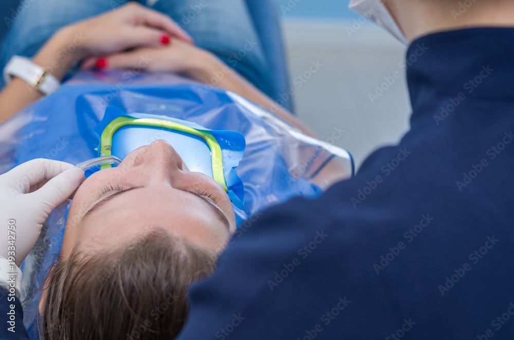 Great concept of dental procedure, young blond Brazilian woman in