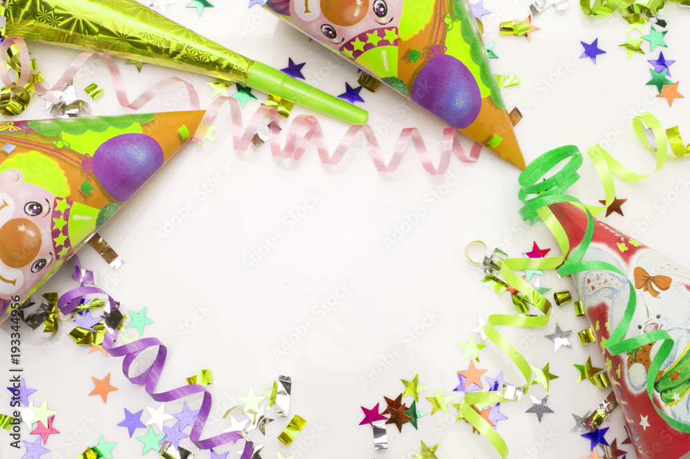 Fototapeta premium Greeting card for carnival party. hat and candles on white background.