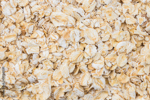  texture background Heap of rolled oats. Closeup. Top view photo