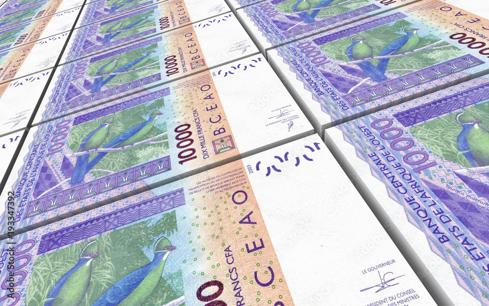 Obraz premium West African CFA francs bills stacked background. 3D illustration.