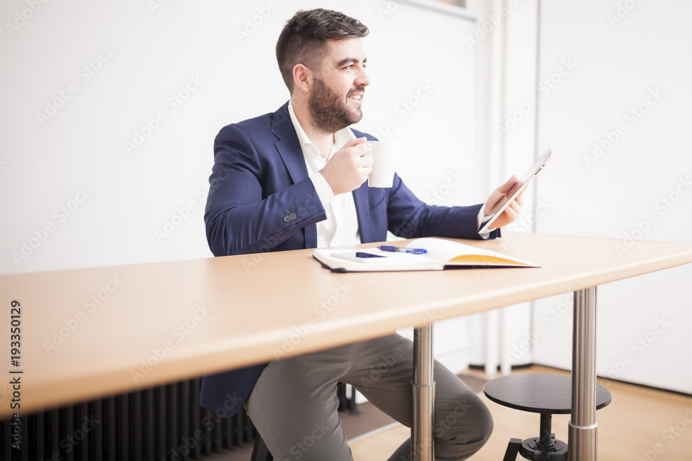 businessman in suit in meeting room with tablet and coffee 02 businessman in suit in meeting room with tablet and coffee 02