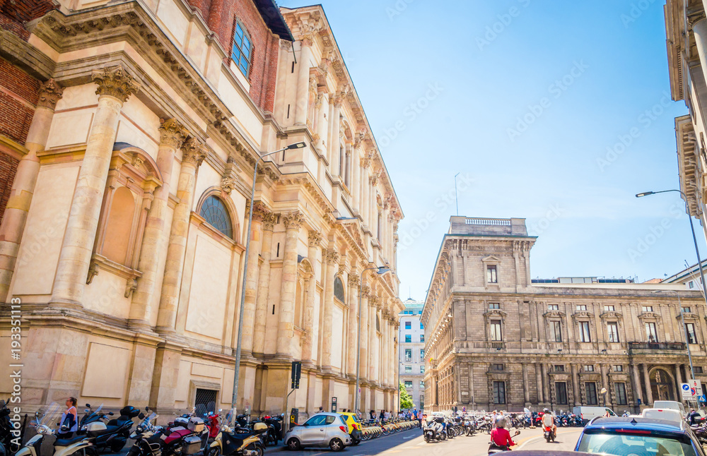 Fototapeta premium Beautiful street with ancient buildings in the center of Milan, Italy