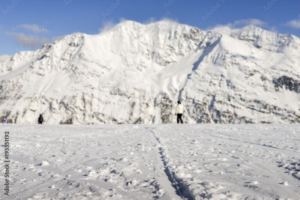Selective focus of snowy slope in the famous and scenic ski resort of La Thuile, Aosta Valley, Italy Selective focus of snowy slope in the famous and scenic ski resort of La Thuile, Aosta Valley, Italy
