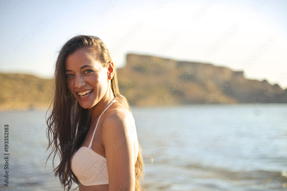 Smiling girl at the beach