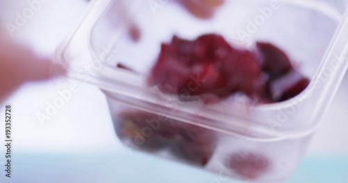 4K Professional chef preparing gourmet starter dish in restaurant kitchen. Close up on ingredients, no faces can be seen. photo