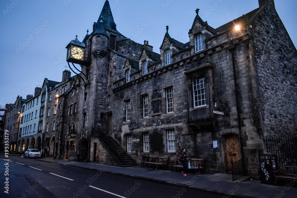 Fototapeta premium typical street in the city of edinburgh shooted during the blue hour.