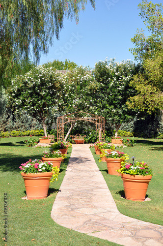 Stone Walkway with Potted Plants Along