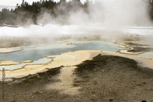 Steaming spring rock formation in Upper Geyser Basin, Yellowstone National Park