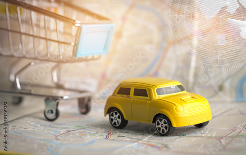 Yellow Miniature Car on small shopping cart on Bangkok city map with radar, Concept for travel around direction to destination with car dealer, cars exhibition show, car insurance for sale customers