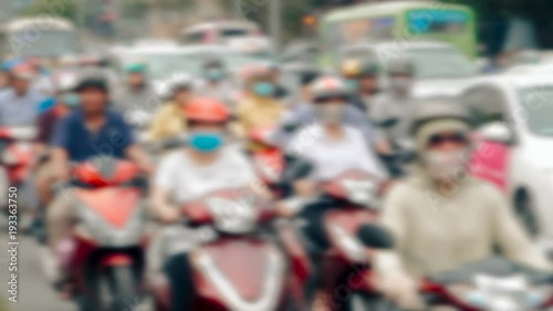 Wallpaper Mural Unrecognisable anonymous crowd people driving motorbike defocused in Vietnam Torontodigital.ca