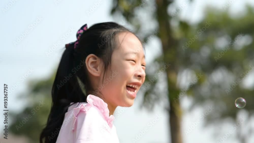 Cute Active Girl Playing Seesawing on the Playground During Summer Sunny Day. Cute Active Girl Playing Seesawing on the Playground During Summer Sunny Day.