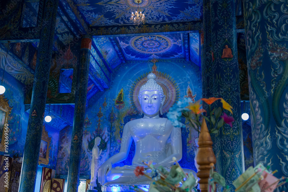 Fototapeta premium CHIANG RAI, THAILAND - February, 2018: Very beautiful buddha image in the chapel of Wat Rong Sua Ten. This place is the popular attraction for Chiang Rai