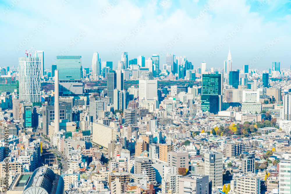 Asia Business concept for real estate and corporate construction - panoramic modern city skyline aerial view of Shinjuku area under blue sky in Tokyo, Japan Asia Business concept for real estate and corporate construction - panoramic modern city skyline aerial view of Shinjuku area under blue sky in Tokyo, Japan