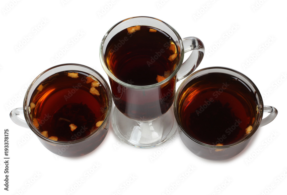 Black tea in a glass cup on a white background