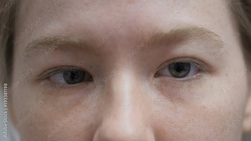 Close Up of Young Female Eyes Looking at Camera Close Up of Young Female Eyes Looking at Camera