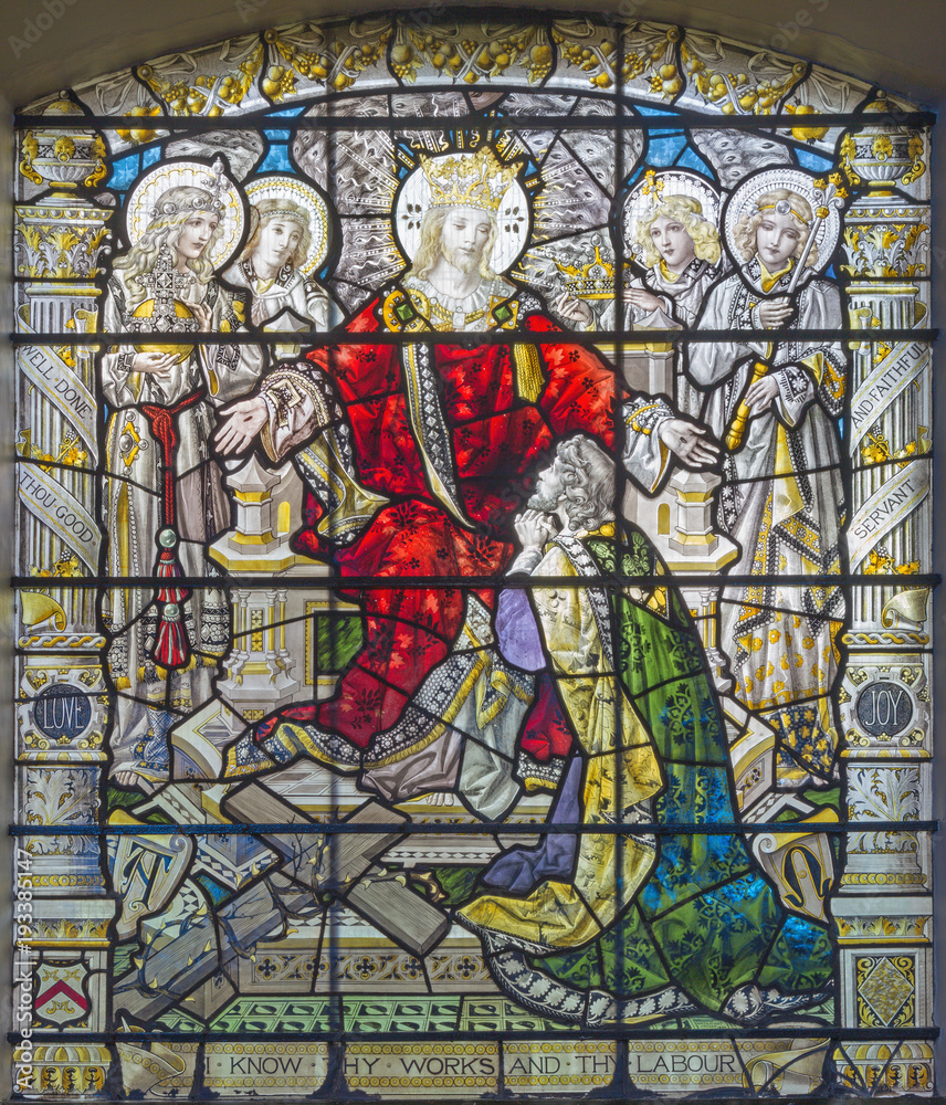 LONDON, GREAT BRITAIN - SEPTEMBER 15, 2017: The resurrected Jesus the King and among the angels on the satined glass of St James's Church, Clerkenwell by T. F. Ward and Hughes manufacturers (1898).