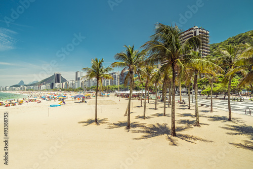 Palm trees on Copacabana Beach. Summer time. Rio de Janeiro, Brazil