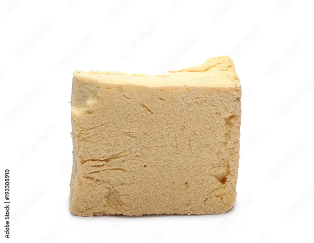 Old, torn yellow sponge isolated on white background Old, torn yellow sponge isolated on white background