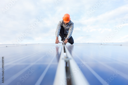 Engineers are checking the electrical system. Selective focus. Engineers and executives are discussing plans.