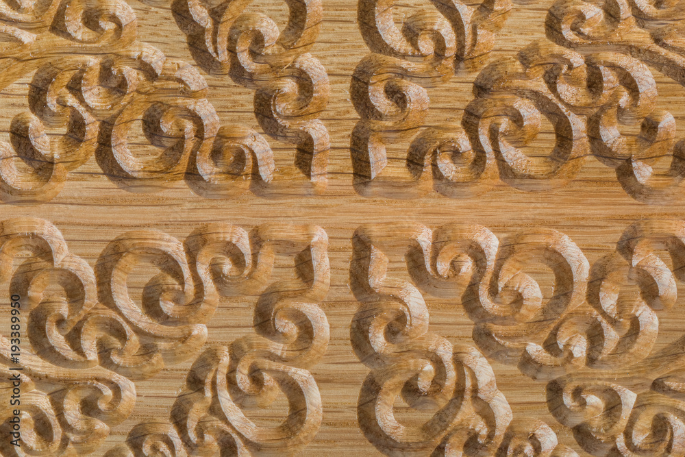 Carved pattern on wood background