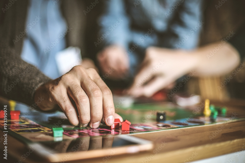 Playing leisure game. Focus is on hand. Close up. Playing leisure game. Focus is on hand. Close up.