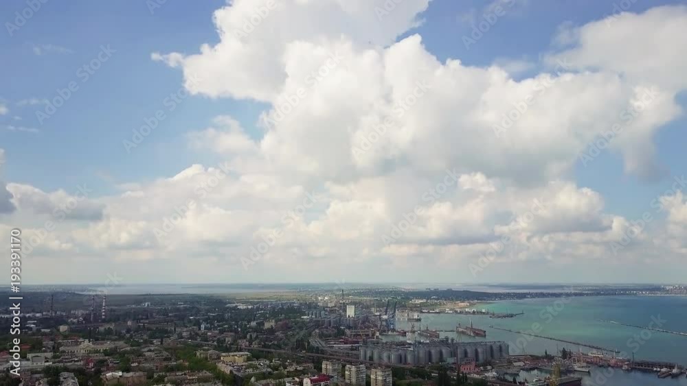 Aerial view of sea city at sunrise drone footage