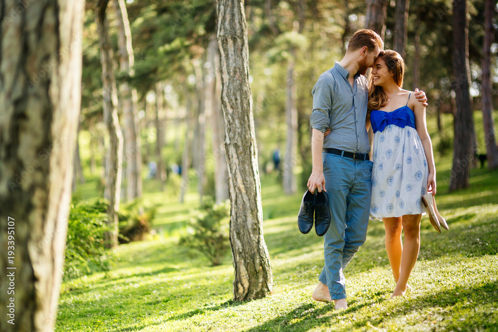 Fototapeta premium Romantic couple walking forest
