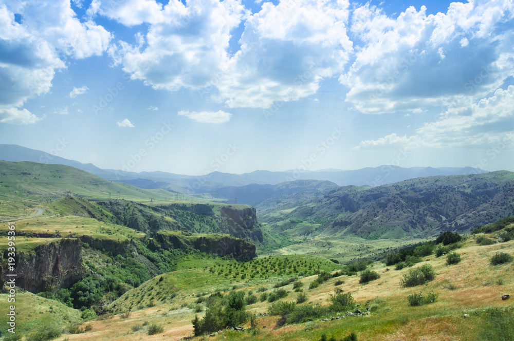 Landscape of the mountain plain, green hills and vineyard, Armenia.