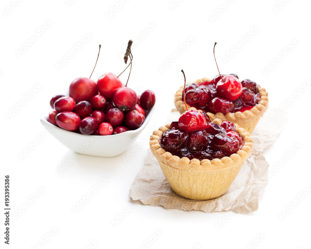 egg custard tarts with cranberry jam isolated on white egg custard tarts with cranberry jam isolated on white