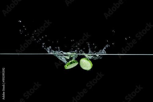 cucumber in water with splash