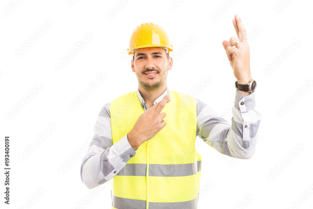 Construction worker or architect feeling lucky and making good luck gesture. Construction worker or architect feeling lucky and making good luck gesture.