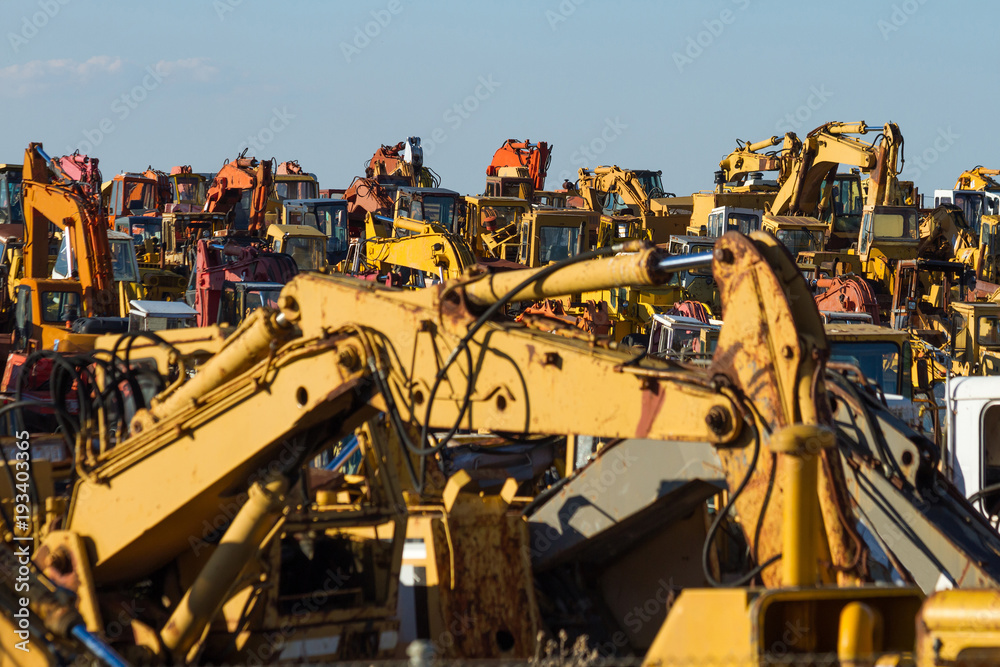 Cemetery storage scrapping old excavators and other construction machinery Cemetery storage scrapping old excavators and other construction machinery