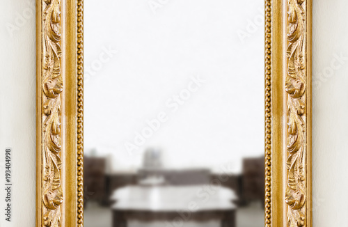 Detail of a carved italian golden wooden frame photo