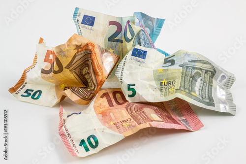 Euro banknotes and white background