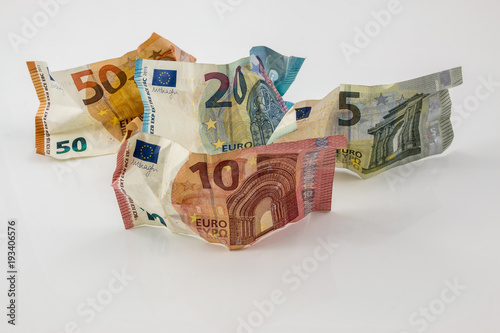 Euro banknotes and white background