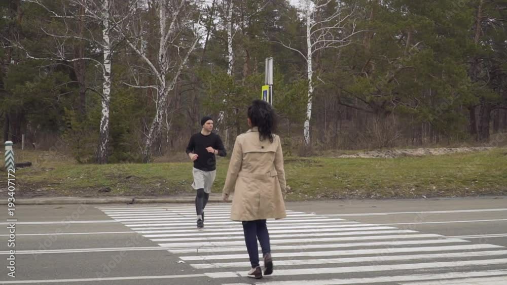 Two strangers falls in love in each other walks through crosswalk Two strangers falls in love in each other walks through crosswalk