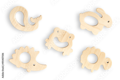Organic baby teethers isolated on white background. Wooden animal toys set for babies.