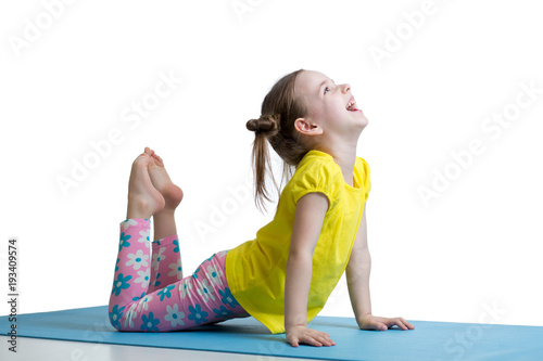 Child doing fitness exercis...