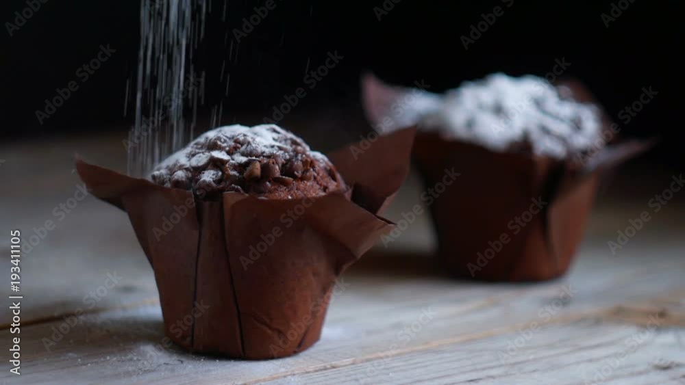 Muffin cake with white powdered sugar