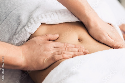 Professional massage of the abdomen. © Marina Varnava