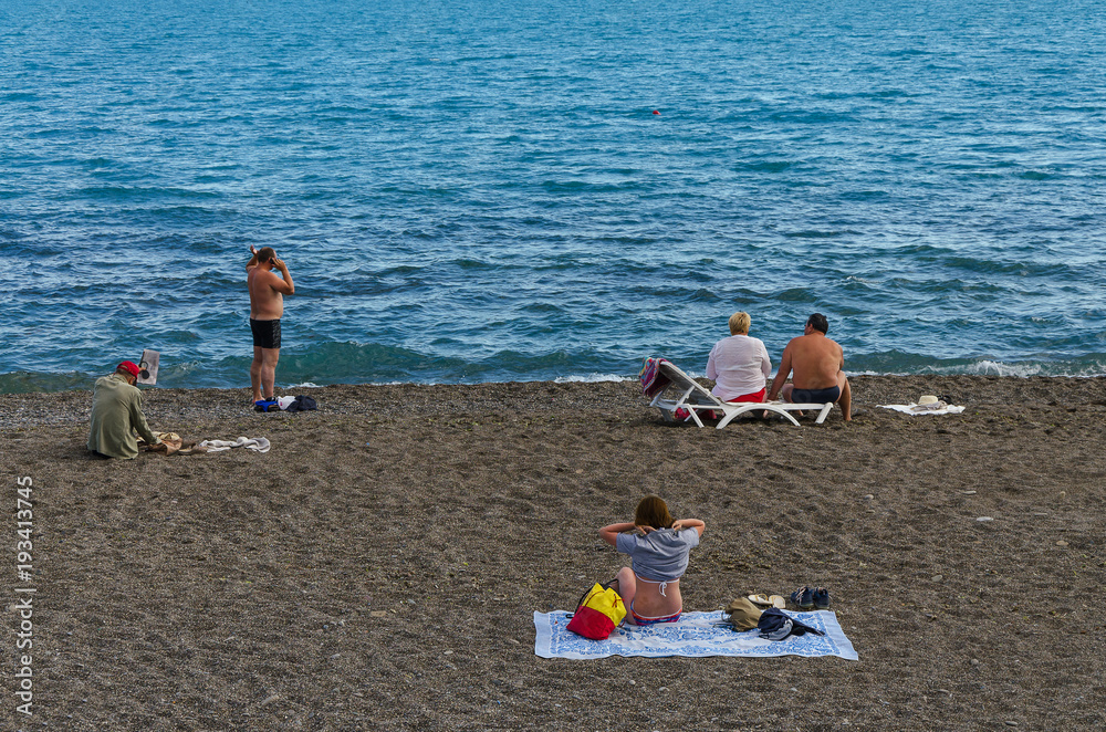 People are resting on the Black Sea coast in Sudak in the Crimea. People are resting on the Black Sea coast in Sudak in the Crimea.
