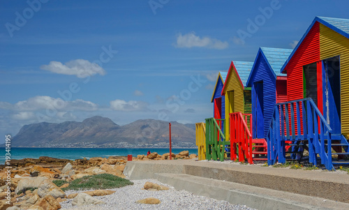 Colorful houses on the beach of St James, False Bay in Cape Town, South Africa photo