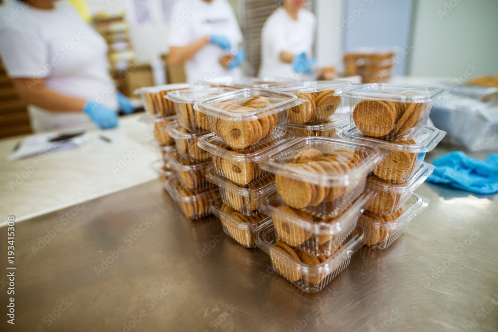 Cookie factory, food industry. Fabrication packing. Cookie production.