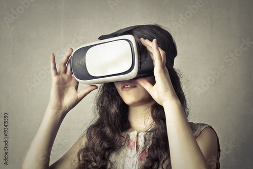 Girl experiencing virtual reality