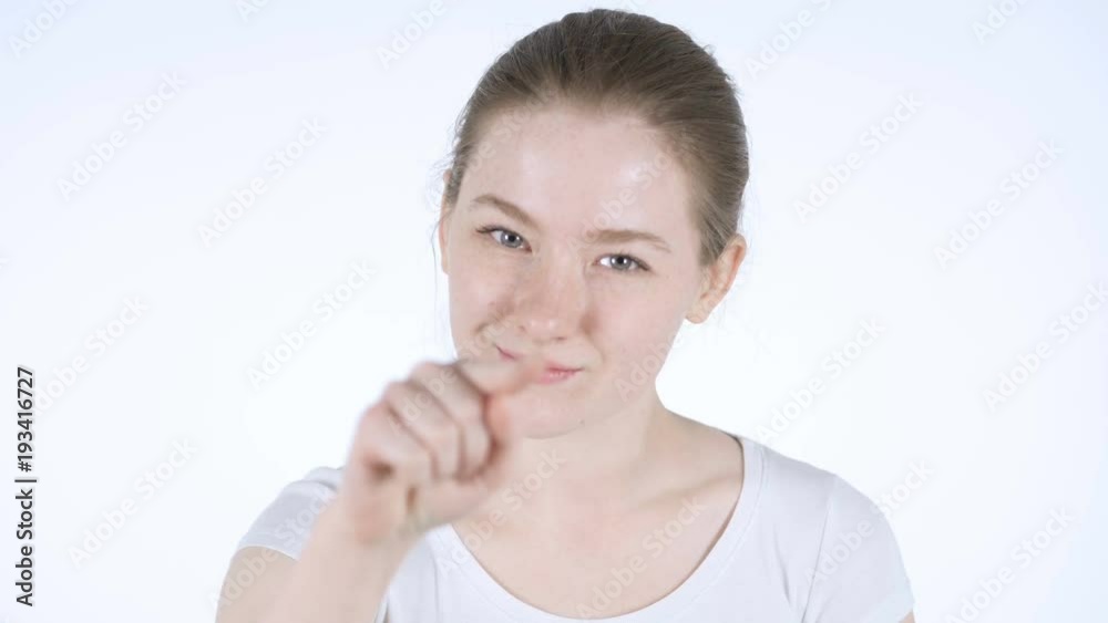 Pointing toward Camera, Redhead Woman, White Background Pointing toward Camera, Redhead Woman, White Background